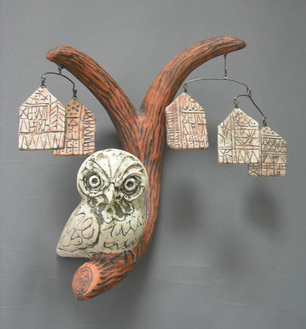 M L Schumacher ceramic sculpture of wall hanging branch with owl and mobiles of sgrafitto'd houses.